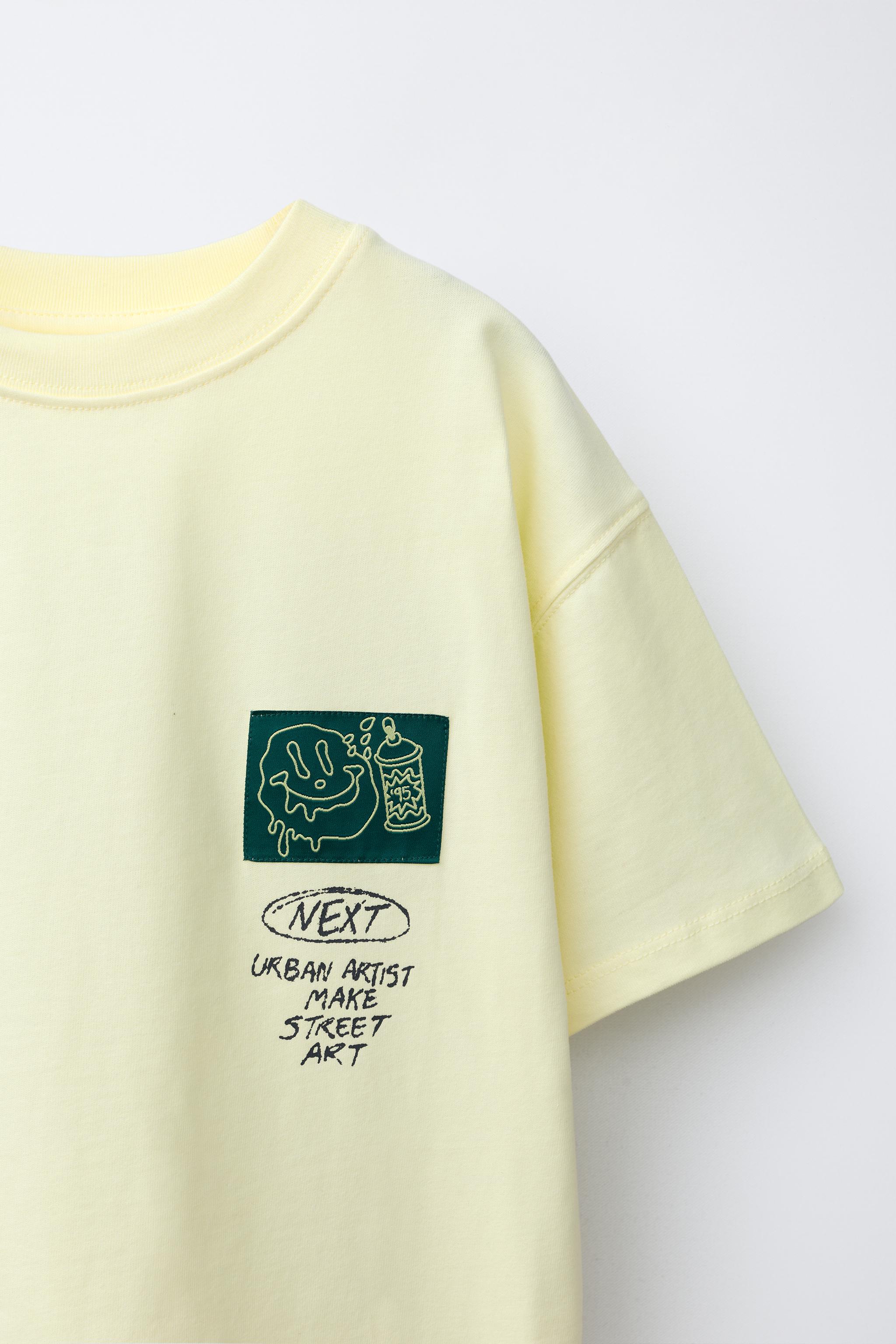T-SHIRT IMPRIMÉ GRAFFITI